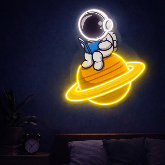 Astronaut Reading on Saturn Neon Sign – Cute Space LED Wall Light