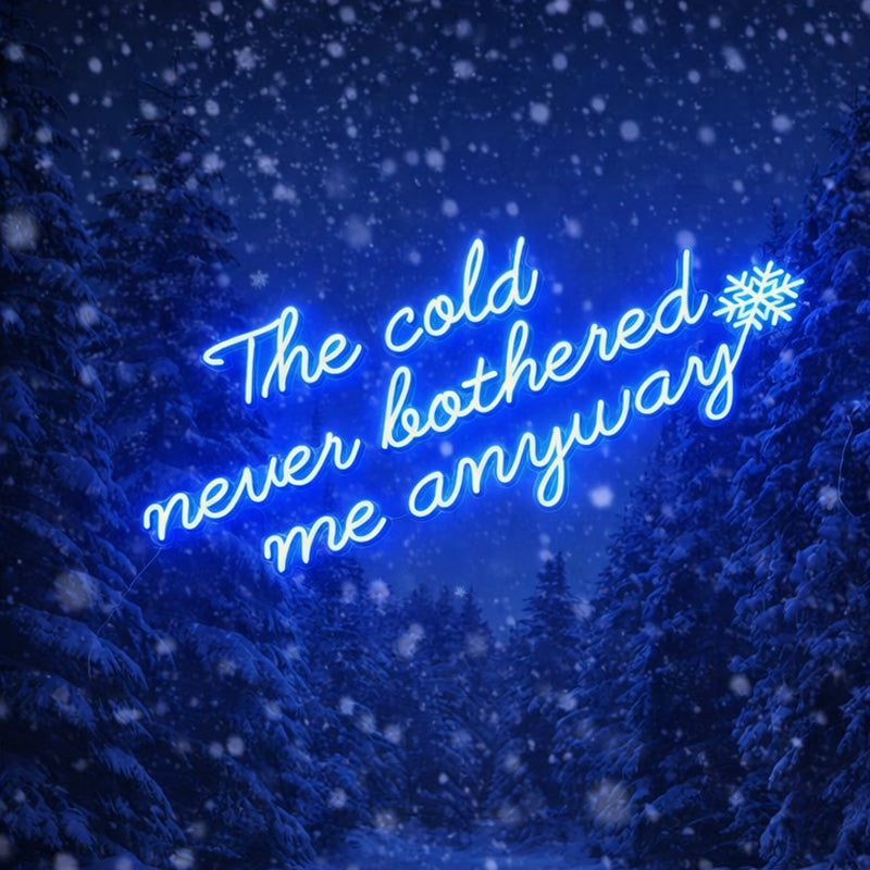 “The Cold Never Bothered Me Anyways” Neon Sign – Blue Script LED Neon Quote with Snowflake Accent