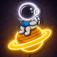 Astronaut Reading on Saturn Neon Sign – Space-Themed LED Wall Light Decor