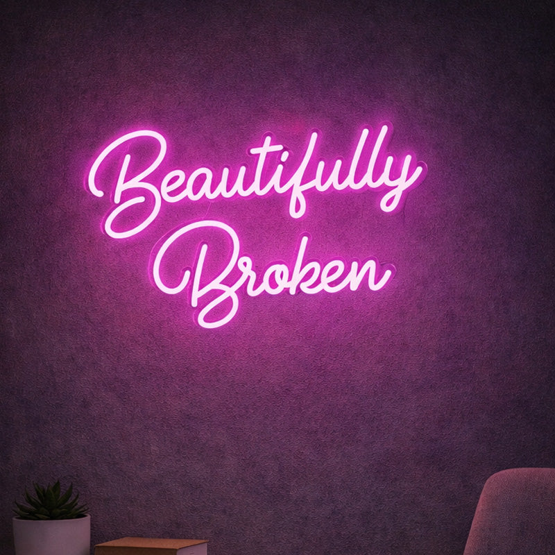 2_BeautifullyBroken_NeonSign_PinkLEDTextNeonQuoteforWedding_Event_FloralBackdrop.jpg